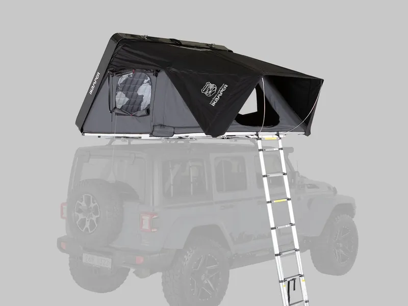 iKamper Skycamp 3.0 hardshell rooftop tent fully open above a Jeep Wrangler with the ladder deployed