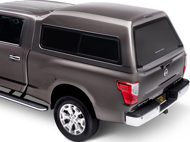 A.R.E. MX Series painted fiberglass truck cap mounted on a pickup bed